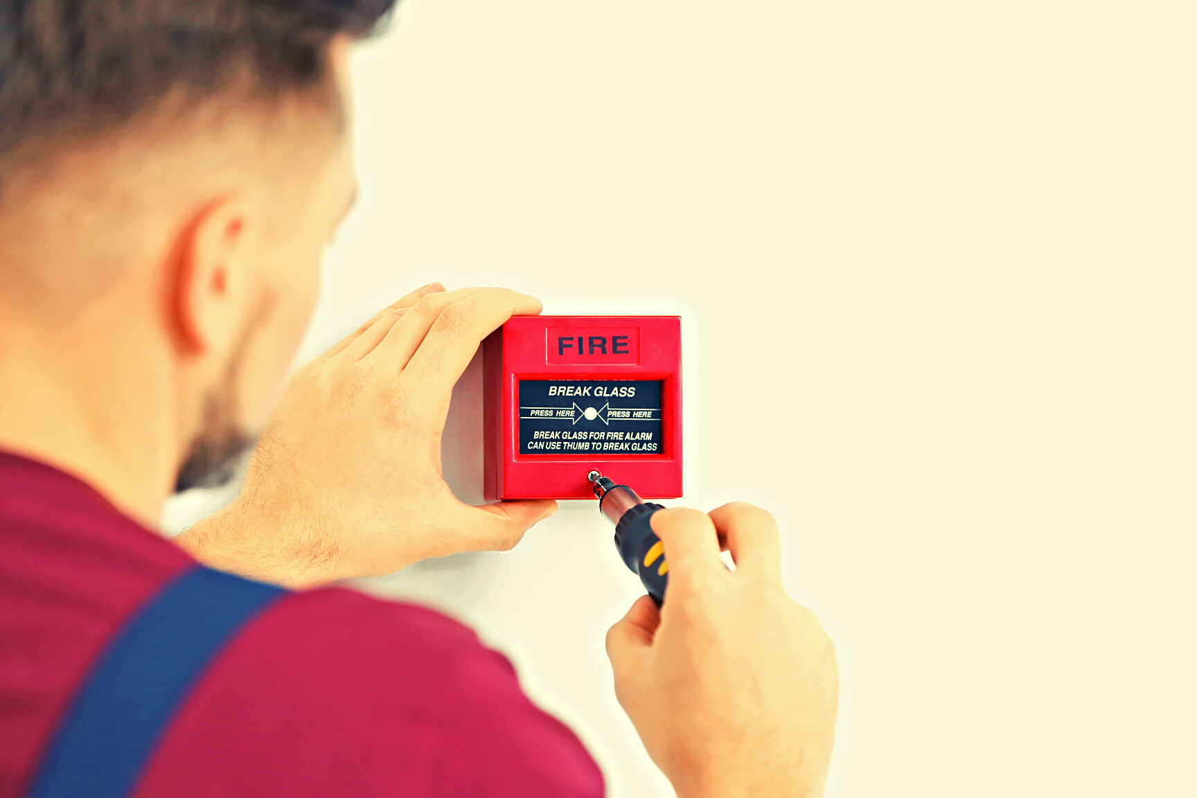 Electrician Installing Fire Alarm System