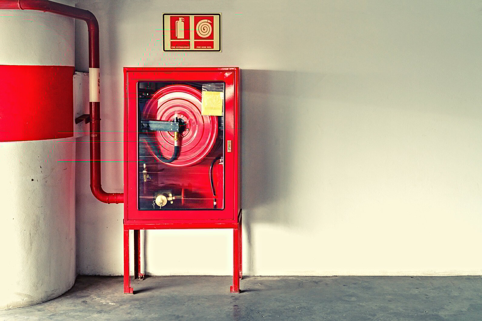 fire extinguish equipment with white wall